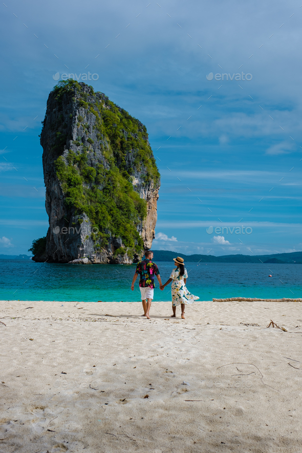 Koh Poda Krabi Thailand, Asian woman and European men walking on the tropical beach of Koh Poda - Stock Photo - Images