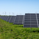 Solar panels with wind turbines in the back - PhotoDune Item for Sale