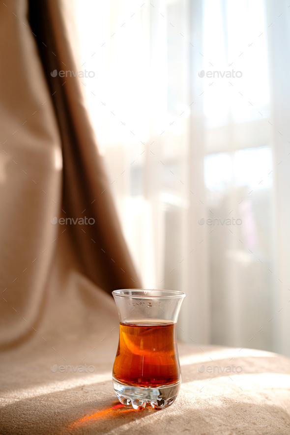 traditional turkish tea cup on fabric background