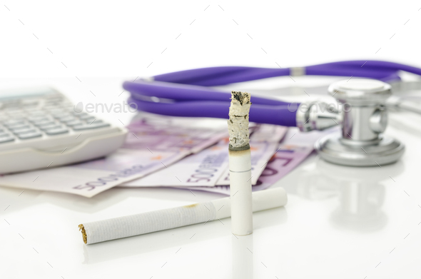Costs and dangers of smoking - Stock Photo - Images