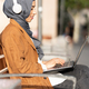 Muslim woman using a laptop in the steet - PhotoDune Item for Sale