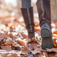 Boots of a woman walking in the street. Autumn - PhotoDune Item for Sale