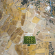 Aerial view on a green football field during drought on sifnos island, Greece - PhotoDune Item for Sale