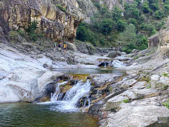 Group of Unrecognizable Peoples walking to go canyoning in Chassezac gorges - Stock Photo - Images