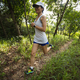Woman runner running on forest trail - PhotoDune Item for Sale
