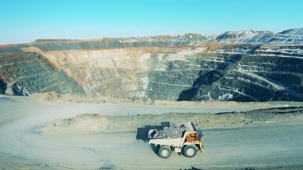 Loaded Truck on the Road of an Openpit Mine alt