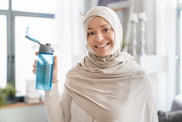 Portrait Of A Mature Thirsty Arabian Muslim Islamic Woman In Hijab 