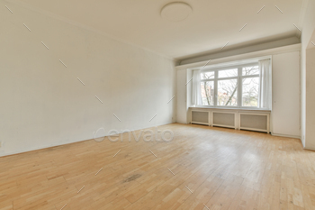 Empty room with window and radiator
