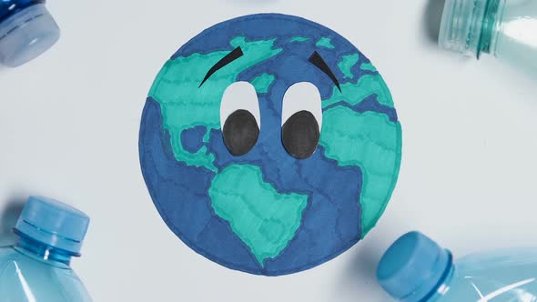 Plastic Bottle Discarding on Earth Planet Picture, Environment Pollution Concept alt