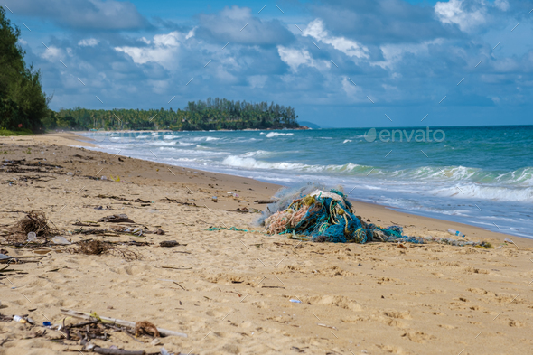 plastic waste on the beach of Phuket Thailand , monsoon season al waste from the ocean come back