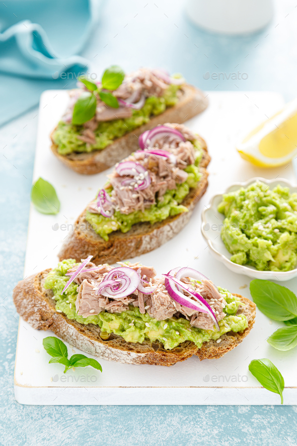Toasts with canned tuna and avocado guacamole. Healthy food, diet