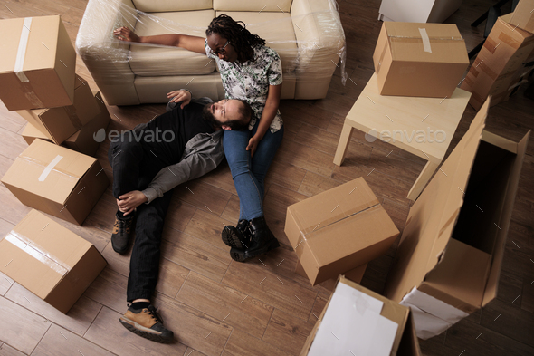 Life partners dreaming about future family in new rented apartment
