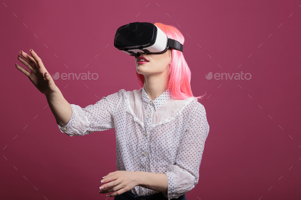 Female model using vr glasses with augmented reality tech