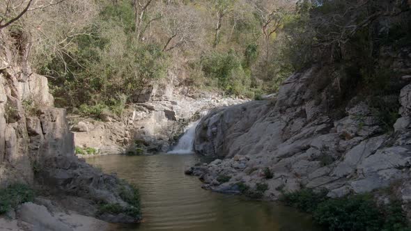 Approaching On Yelapa Small Waterfall On Tropical Forest In Jalisco, Mexico. Aerial Dolly Shot alt