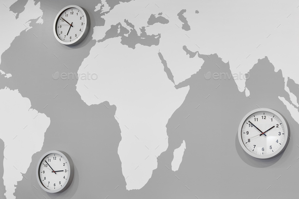 Time zone watches on a worldwide map. Global trade business - Stock Photo - Images