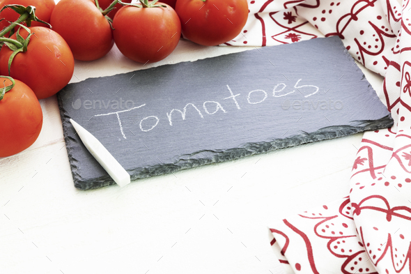 Fresh Tomatoes and Chalkboard Sign - Stock Photo - Images