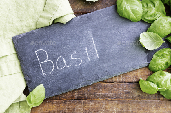 Basil Leaves and Chalkboard Sign Stock Photo by charlotteLake