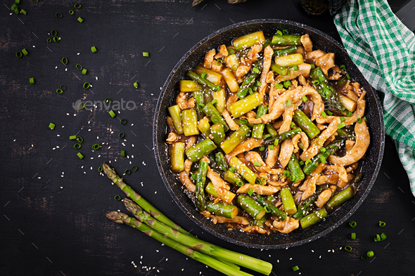 Stir fry with chicken and asparagus. Chicken stirfry. Chinese food. Top view, above