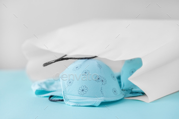 Delicate set of lingerie in a gift bag. The concept of clothing, accessories, shopping.