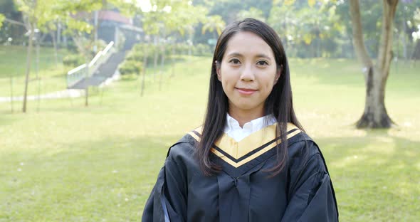 Asian woman graduation alt