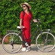 Wide Shot Portrait of Happy Confident Gorgeous Young Woman in Red Dress Standing with Bicycle - VideoHive Item for Sale
