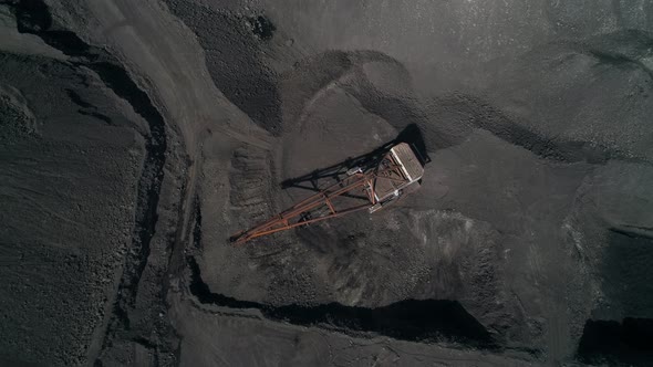 Top View Camera Fly Over Working Walking Excavator in Quarry of Kusbass Coal Deposit