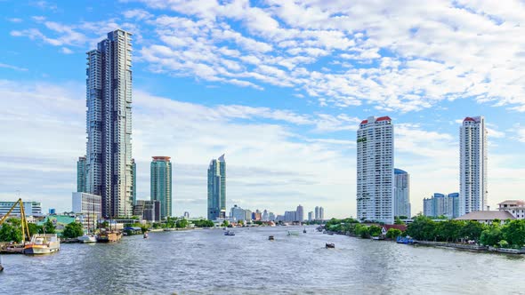 Bangkok city center financial business district, waterfront cityscape; zoom in - Time Lapse