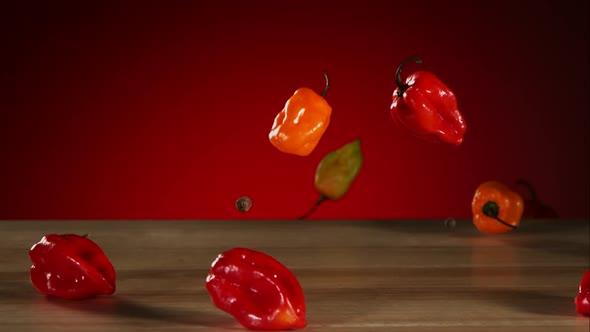 Peppers falling bouncing in ultra slow mo  alt