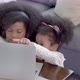 Happy African family with two girl listening to music on laptop or watching movie with headphone. - VideoHive Item for Sale