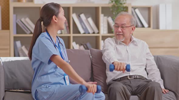 Strong senior man and caregiver enjoying exercise lifting weights, old elderly people working out wi alt