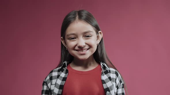 Portrait of Little Girl Smiling Celebrating Surprised and Happy Emotions