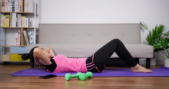 Woman sit up exercise. alt