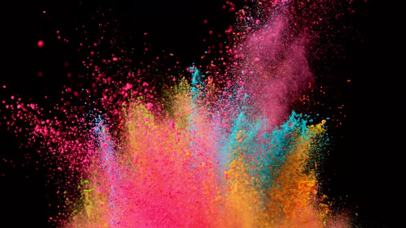 Super Slowmotion Shot of Color Powder Explosions Isolated on Black Background at 1000Fps alt