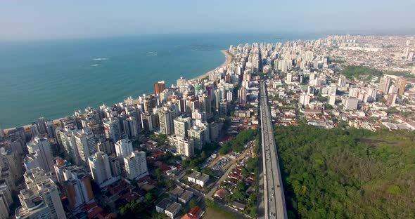 Aerial image of the old town, showing the beginning of the bridge - 4k image alt