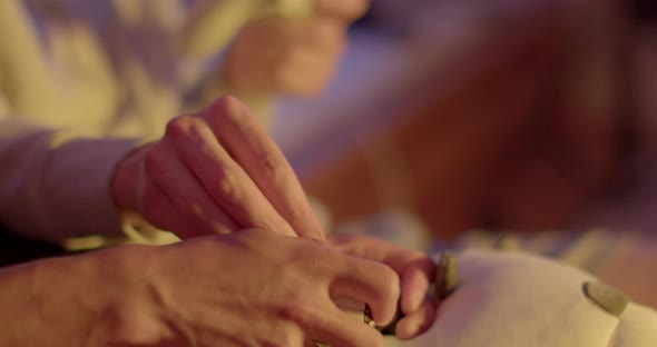 Closeup Gamers Hands Use Video Game Controller Friend Hand Helps Press Buttons alt