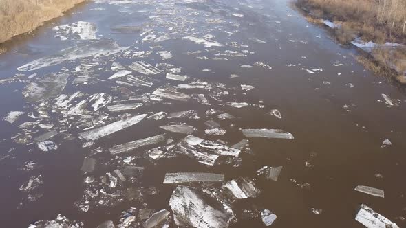 The Ice Floes Floating on the River. The Ice Drift in Spring Time