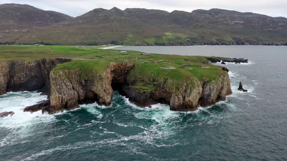 Aerial View of the Ruins of Lenan Head Fort at the North Coast of County Donegal Ireland alt