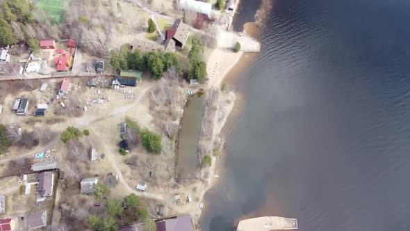 Aerial View of the Vuoksi River, the Forest and the Settlement in Autumn Day, Losevo, Leningrad