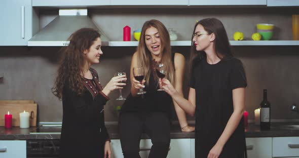 Beautiful Charismatic Ladies Drinking Wine on the alt