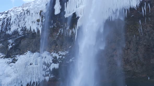 Iceland Panning Up To Reveal The Large Seljalandsfoss Waterfall In Winter