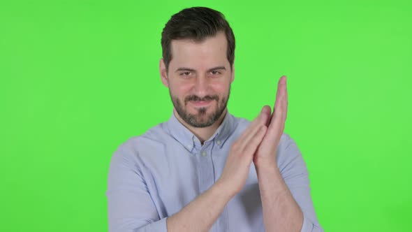 Portrait Shot of Happy Man Clapping Applauding Green Screen alt