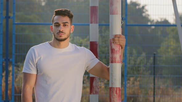 Young Serious Sportsman Coach Goalkeeper or Footballer in Summer Sportswear Athletic Middle Eastern alt