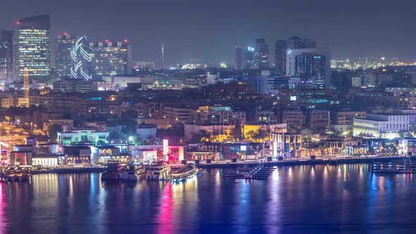 Dubai Creek Landscape Night Timelapse with Boats and Ship Near Waterfront alt