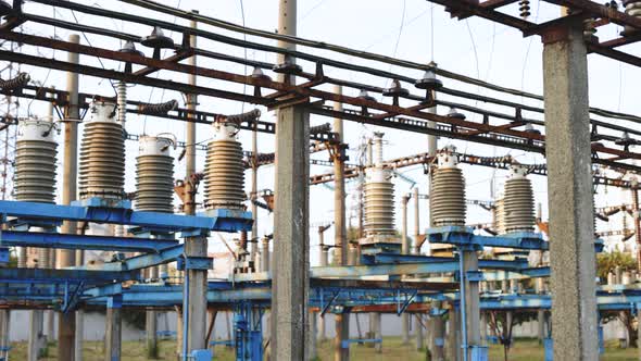 High Voltage Substation With Tall Pylons and Voltage Distribution Cables