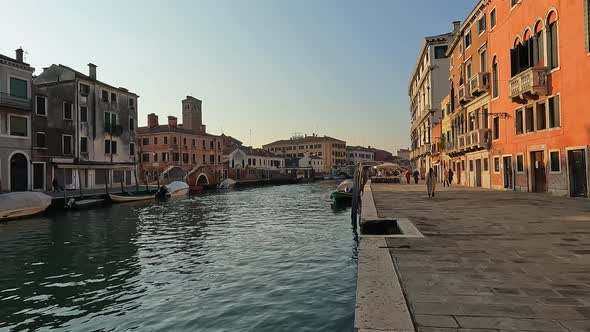 Fpv of Fondamenta Cannaregio and  Venetian canal, Venice in Italy. Slow motion alt