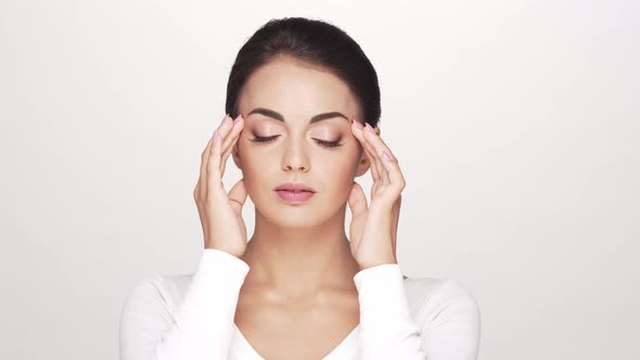 Studio portrait of young and beautiful brunette woman over alt