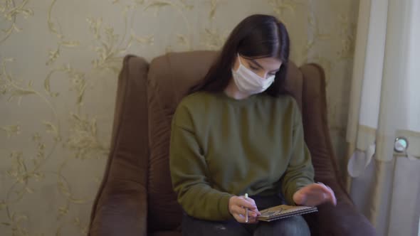 Woman in Medical Protective Mask Stay Home Draws Painting Sketchbook Quarantine