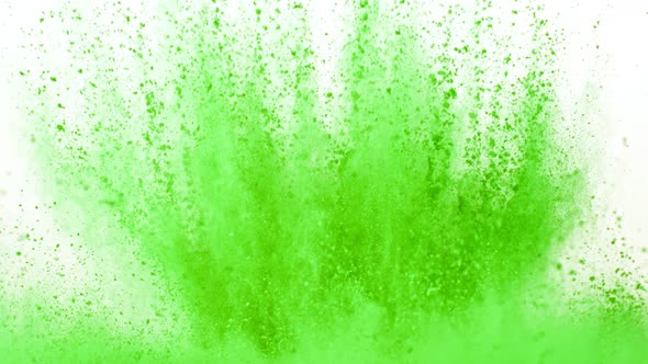 Super Slow Motion Shot of Green Powder Explosion Isolated on White Background at 1000Fps alt