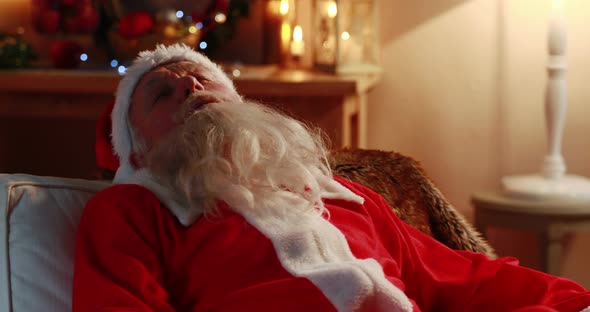 Santa claus sleeping in sofa 4k, Stock Footage | VideoHive