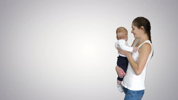 Happy Mother Kissing Adorable Baby, Alpha Channel alt